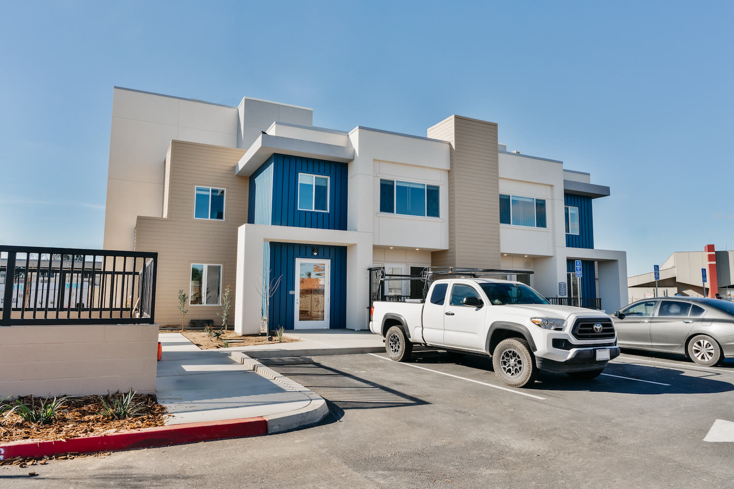Precision Painting crew finishing an exterior in Madera, California